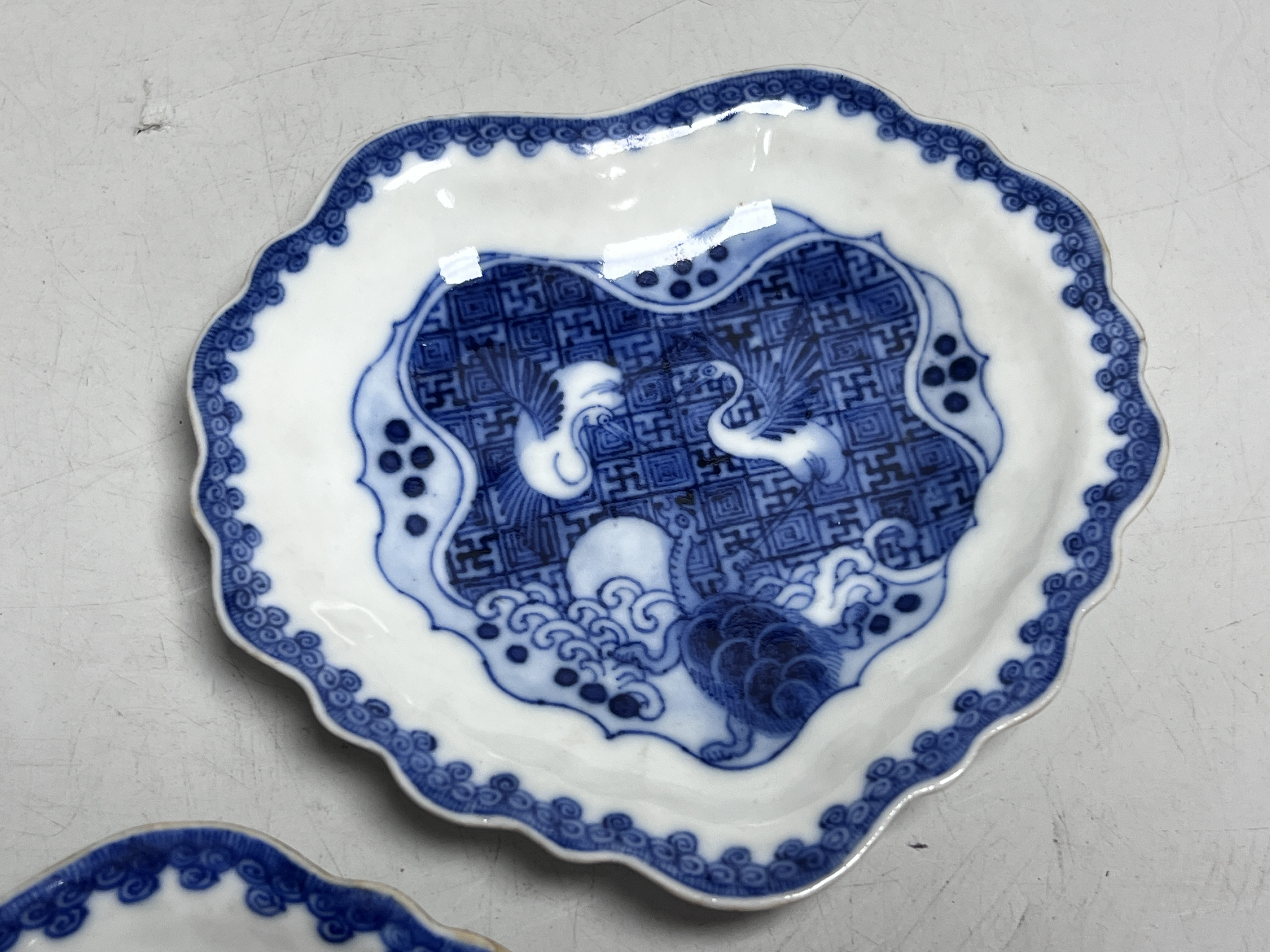 A pair of Chinese 'ko-sometsuke' leaf shaped dishes, 17th century, made for the Japanese market, each 12cm wide